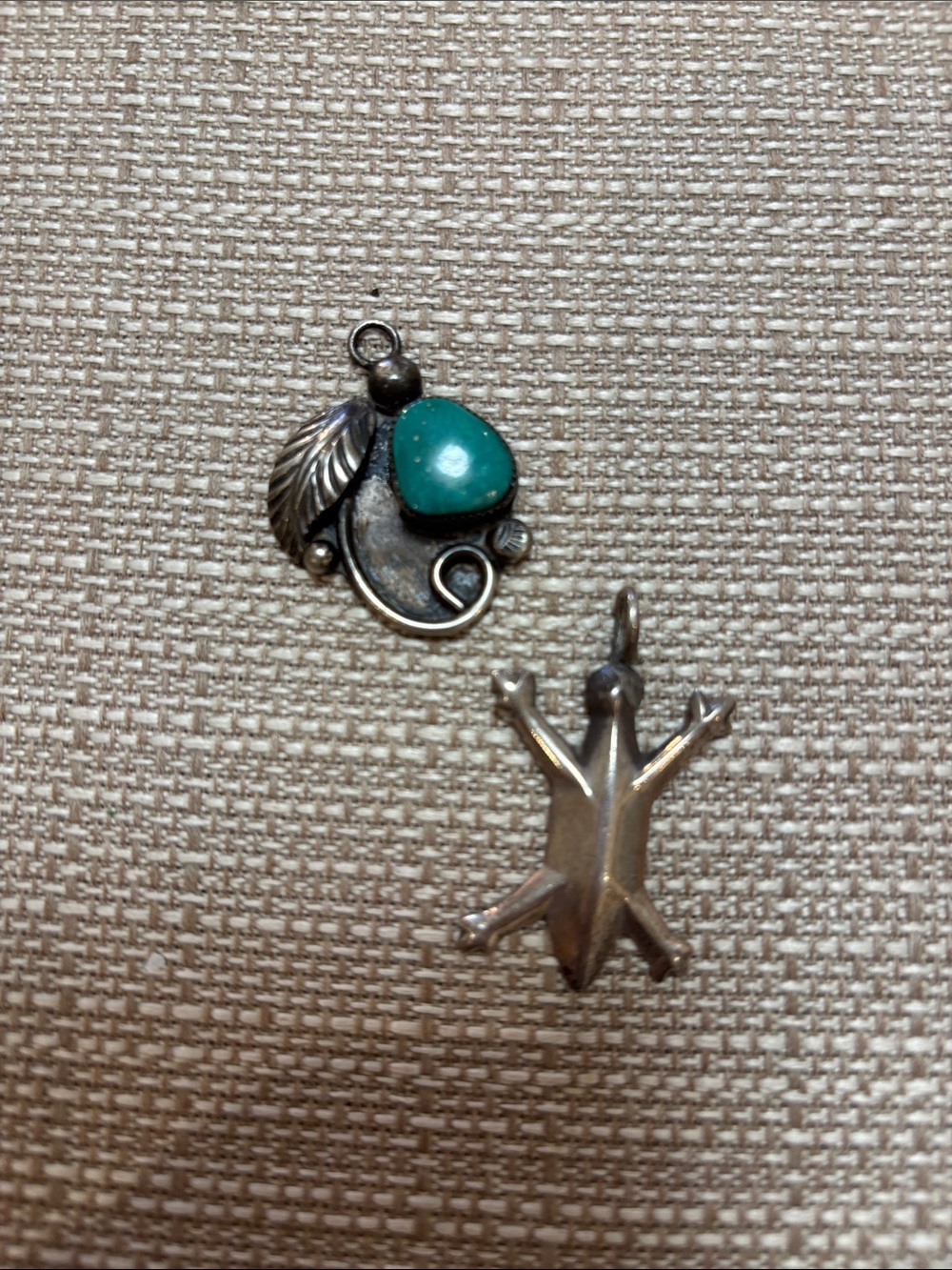 Two Navajo pendants